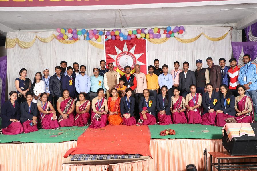 Staff and guests on stage at the school annual function