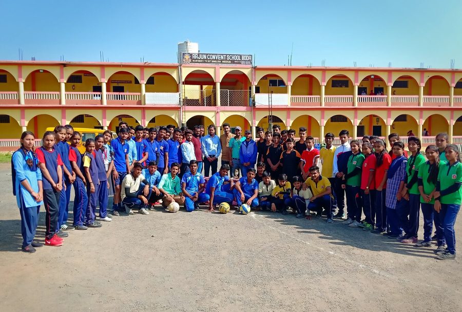 Students at morning assembly outside the school building